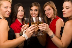Ladies holding wine glasses